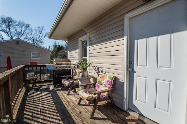 deck featuring grilling area