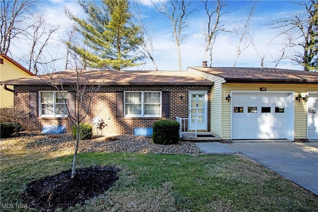 ranch-style home featuring a front lawn, an attached garage, brick siding, and driveway