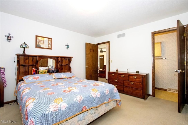 bedroom featuring visible vents, baseboards, and carpet flooring