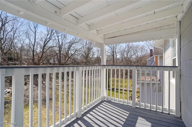 view of wooden balcony with a deck