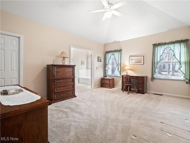 bedroom with carpet, visible vents, baseboards, high vaulted ceiling, and connected bathroom