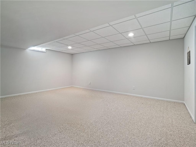 carpeted spare room with recessed lighting, a paneled ceiling, and baseboards