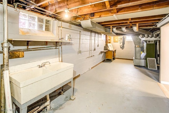 basement featuring a sink