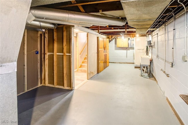 unfinished basement with a sink