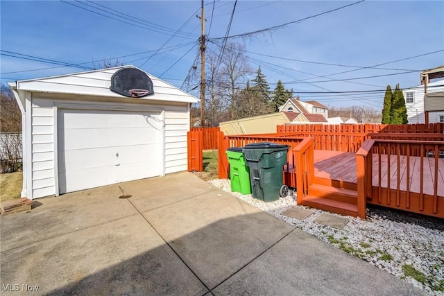 exterior space with driveway and fence