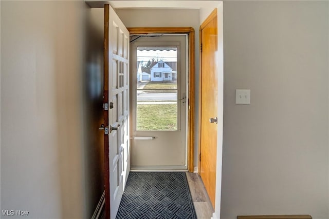 doorway featuring light wood-style flooring