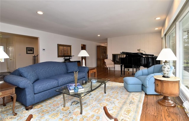 living area featuring recessed lighting and wood finished floors