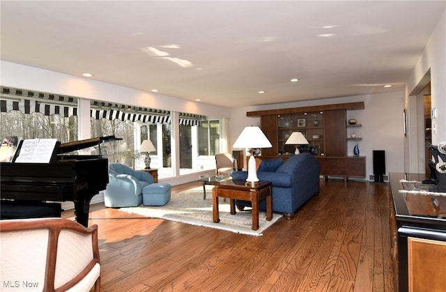 living room featuring recessed lighting and wood finished floors