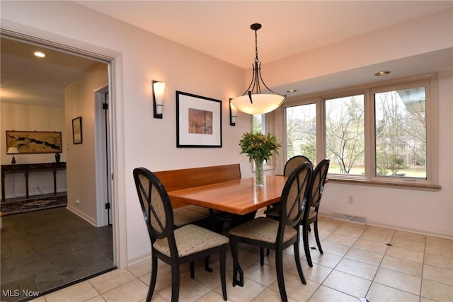 dining room featuring recessed lighting, visible vents, baseboards, and light tile patterned floors