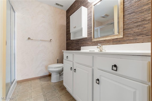 bathroom with visible vents, a shower stall, wallpapered walls, baseboards, and tile patterned floors