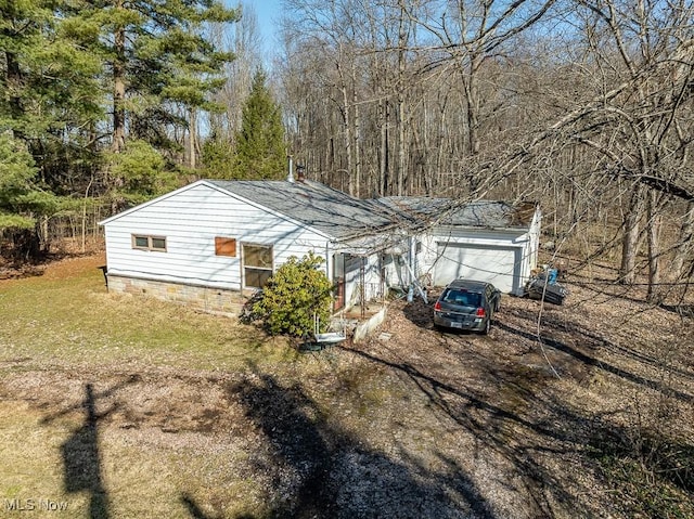 exterior space featuring driveway