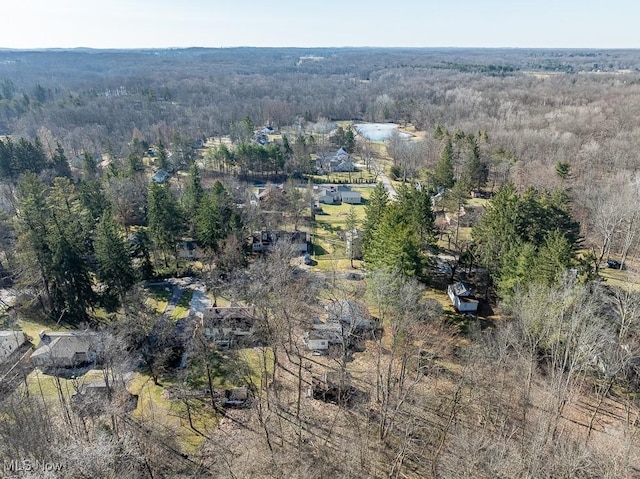 aerial view featuring a forest view