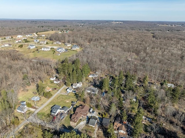 bird's eye view featuring a forest view