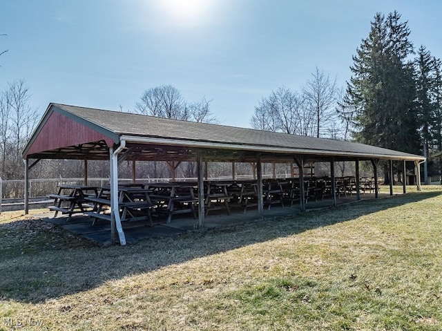 view of home's community featuring a lawn