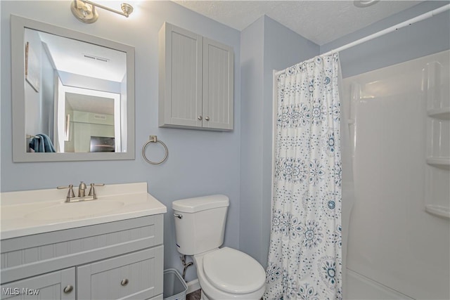 bathroom with a shower with shower curtain, visible vents, toilet, and vanity