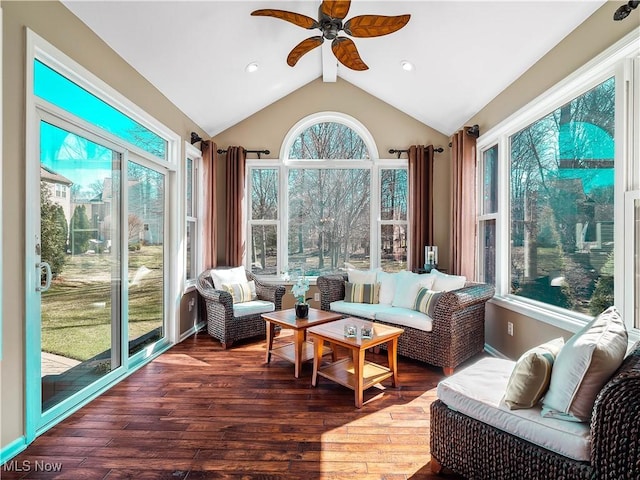 sunroom with vaulted ceiling with beams and ceiling fan