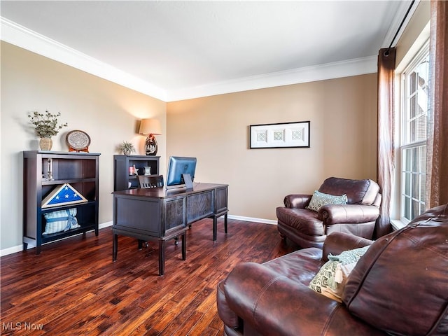 office space featuring baseboards, wood finished floors, and crown molding