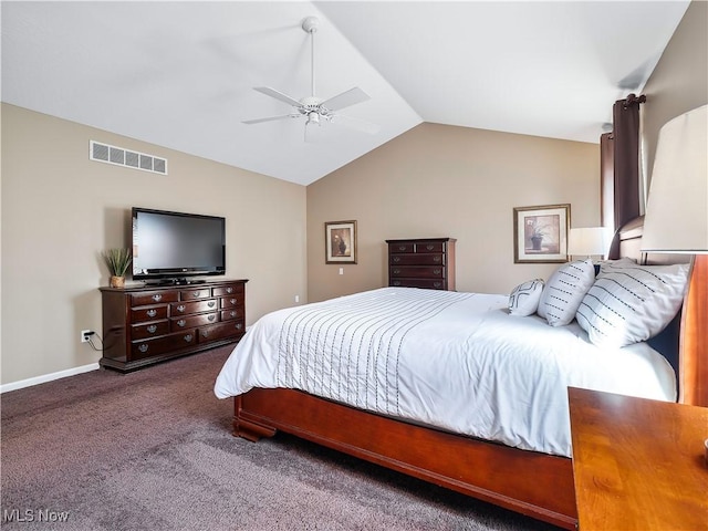 carpeted bedroom featuring visible vents, lofted ceiling, baseboards, and a ceiling fan