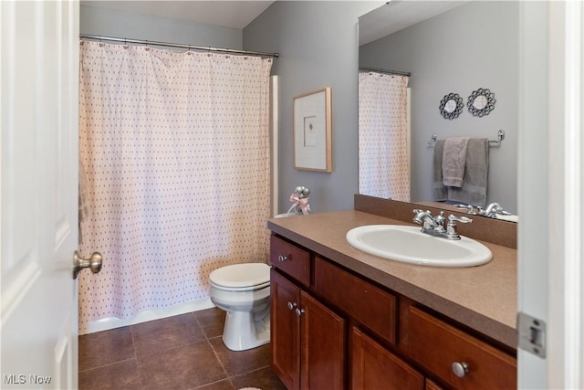 bathroom with vanity, tile patterned floors, toilet, and a shower with shower curtain