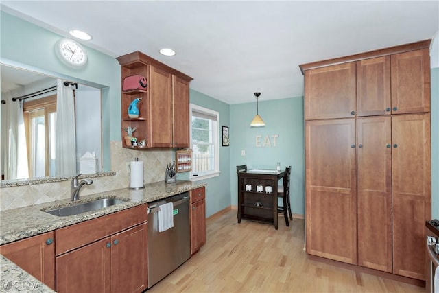 kitchen with a sink, open shelves, backsplash, brown cabinetry, and dishwasher