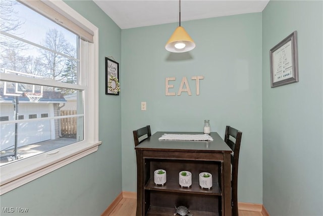 dining room with baseboards