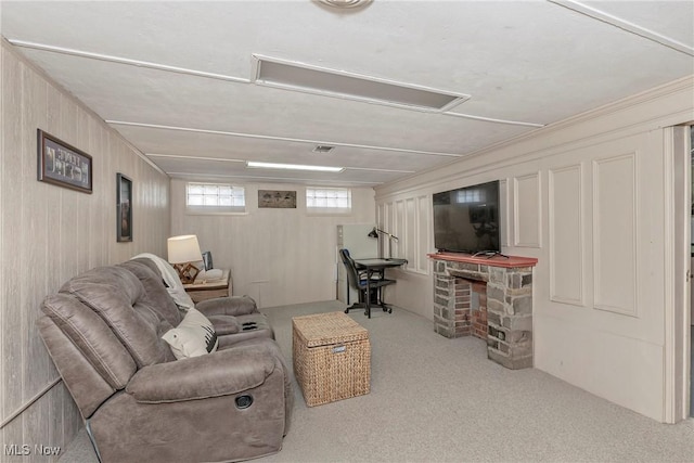 carpeted living area featuring a fireplace