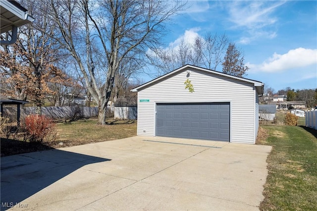 detached garage with fence