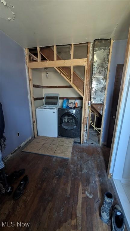 washroom with laundry area and hardwood / wood-style flooring