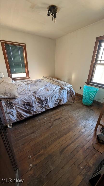 unfurnished bedroom featuring hardwood / wood-style floors