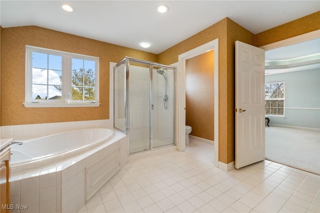 bathroom featuring toilet, a bath, a shower stall, and tile patterned flooring