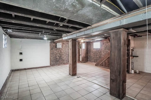 basement featuring tile patterned floors