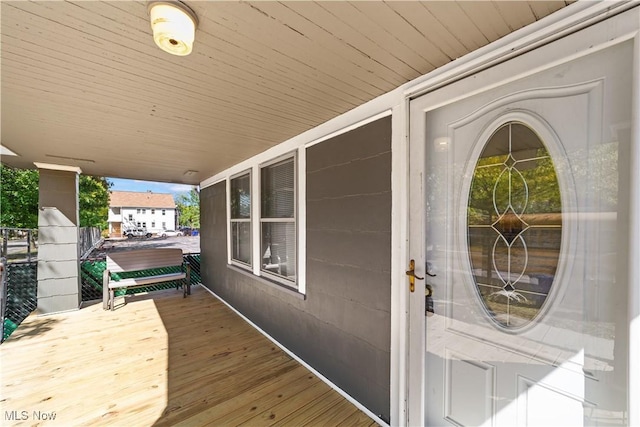 wooden deck featuring covered porch