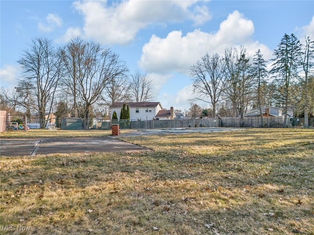 view of yard featuring fence