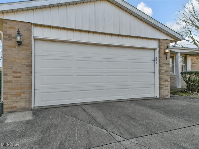 garage featuring driveway