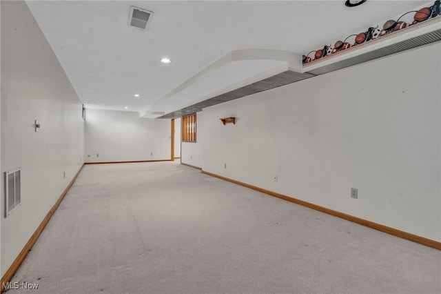 finished below grade area with recessed lighting, carpet flooring, baseboards, and visible vents