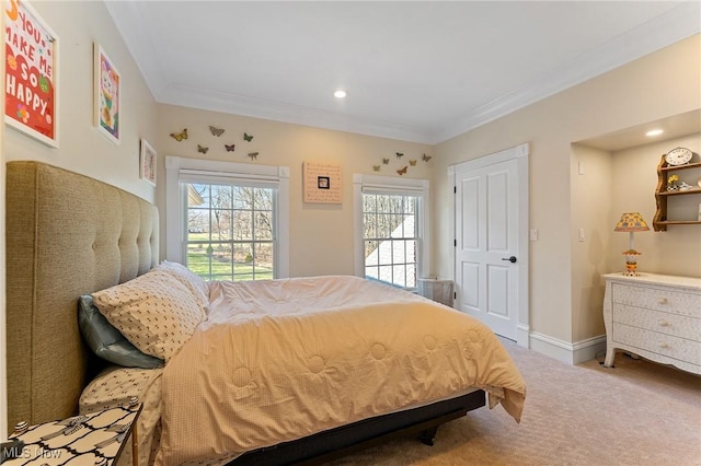 carpeted bedroom with recessed lighting, baseboards, and ornamental molding