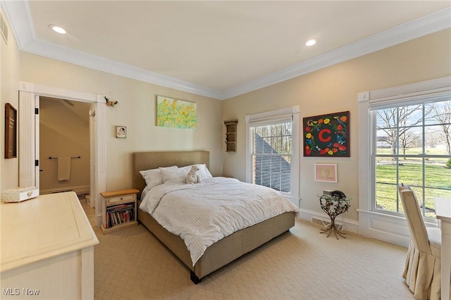 bedroom with recessed lighting, light colored carpet, baseboards, and ornamental molding