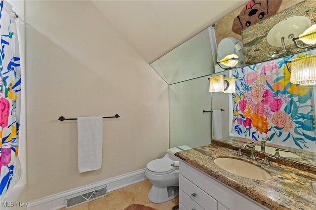 bathroom with vanity, visible vents, tile patterned flooring, curtained shower, and toilet