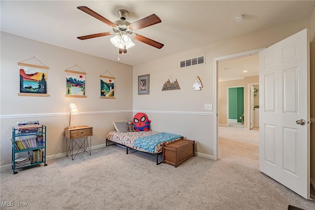 bedroom featuring visible vents, carpet flooring, and baseboards