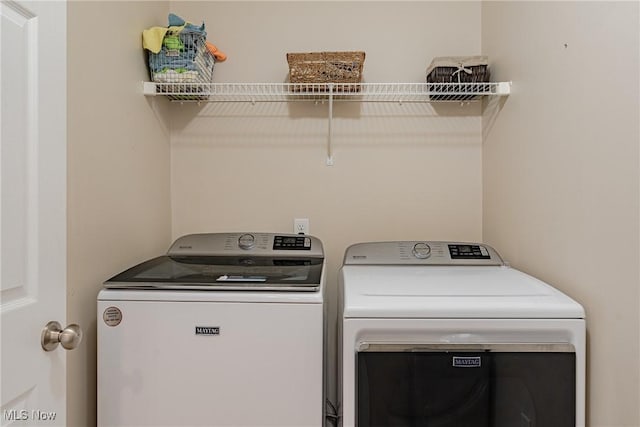 laundry area with washer and dryer and laundry area