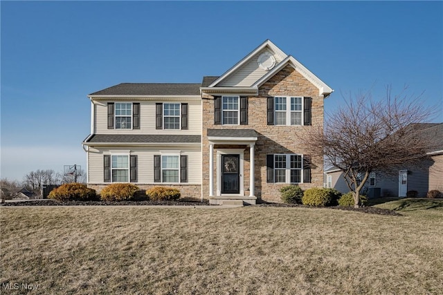 view of front of property with a front lawn, central AC unit, and stone siding