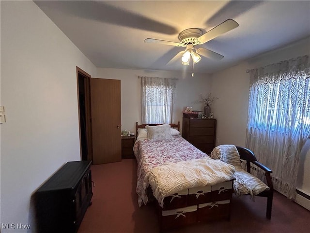 carpeted bedroom with a ceiling fan