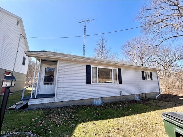 exterior space with a front yard