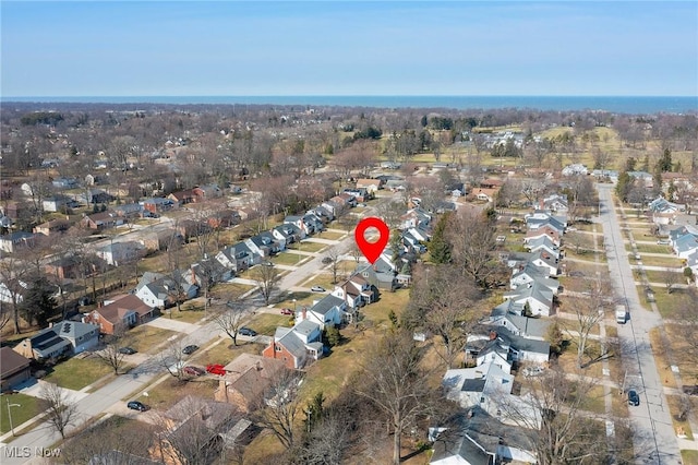 birds eye view of property with a residential view