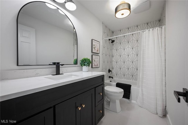 full bathroom with vanity, toilet, and shower / bath combo with shower curtain