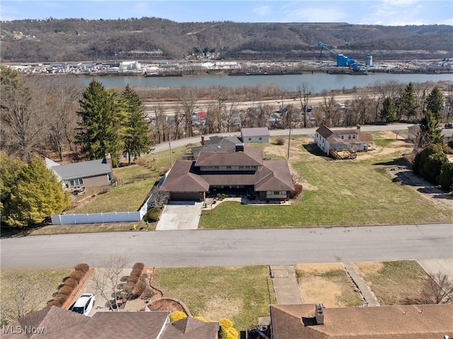 bird's eye view with a water view