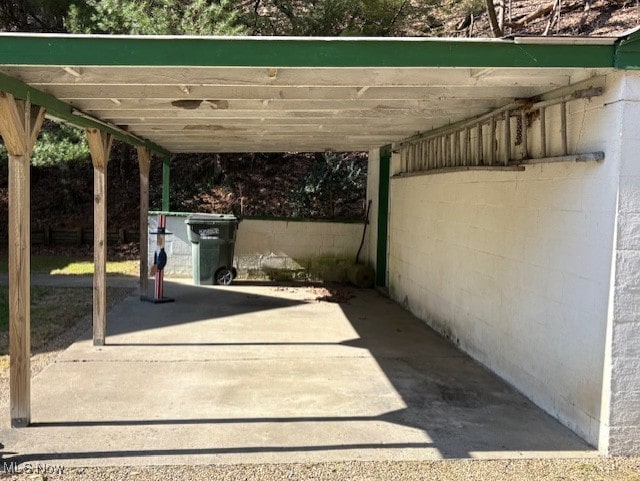 view of patio featuring an attached carport