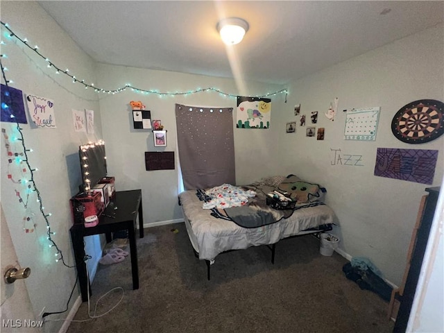 carpeted bedroom with baseboards