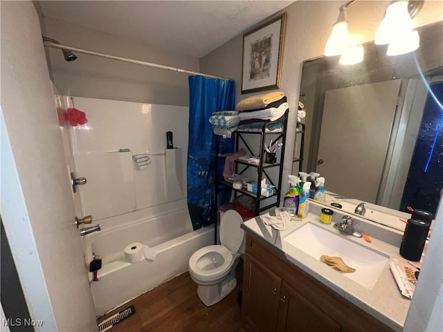 full bathroom with toilet, shower / bath combo with shower curtain, vanity, and wood finished floors