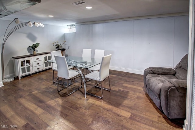 dining area with recessed lighting, visible vents, and wood finished floors